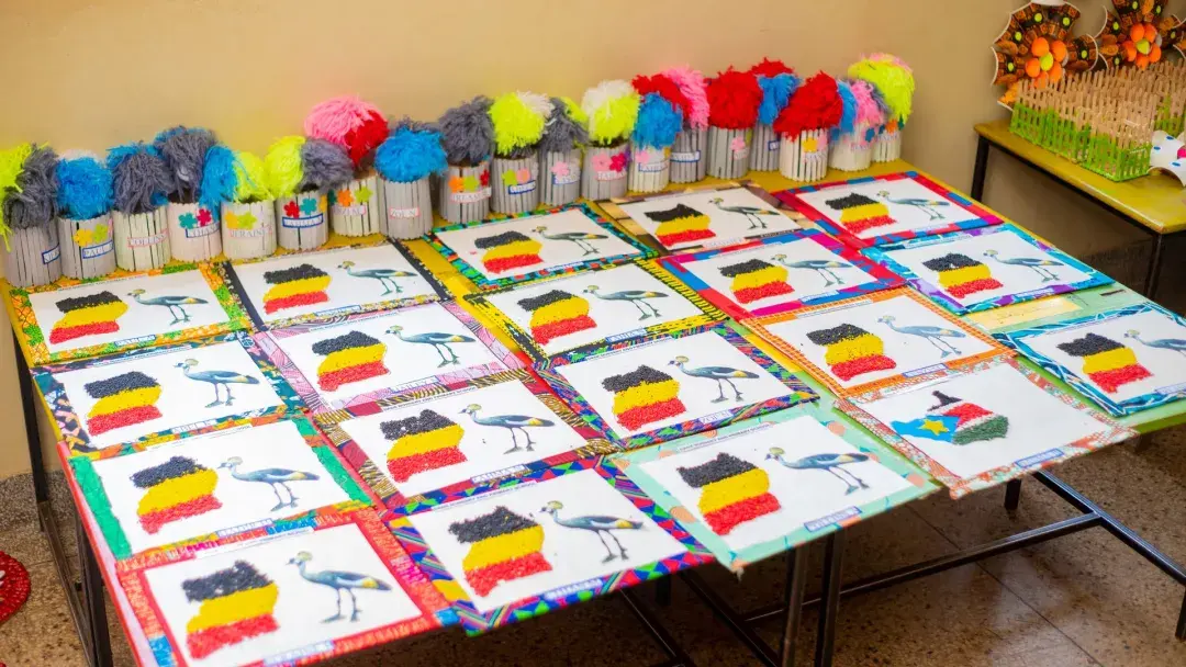 Pasting Uganda flag and flower vase