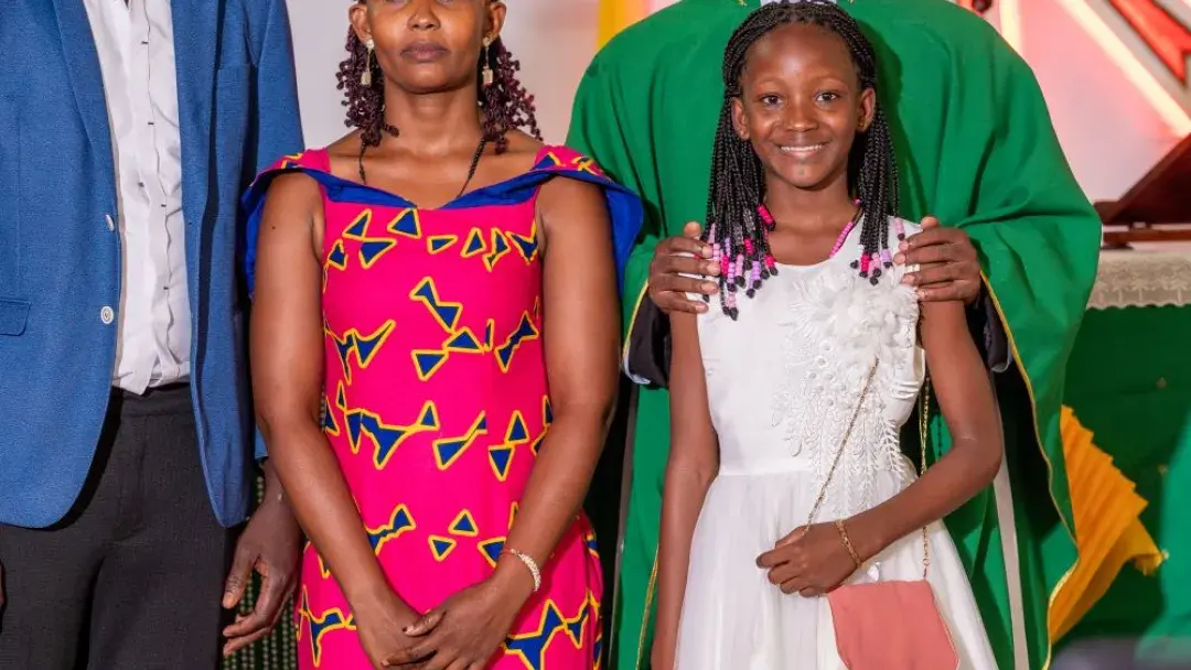 Family picture with priest