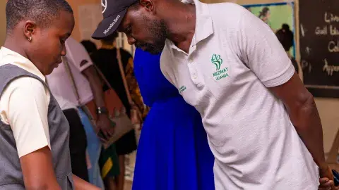 Ketra explaining to a parent