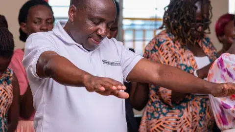 Parent praying for candidates