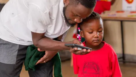 Parent taking picture