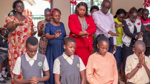 Parents praying for candidates