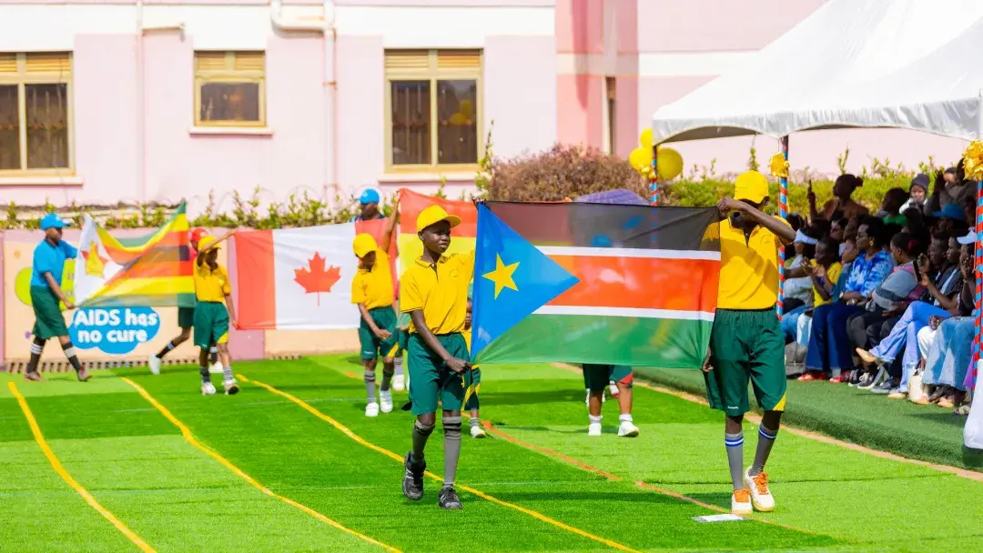 Internal pupils waving flags